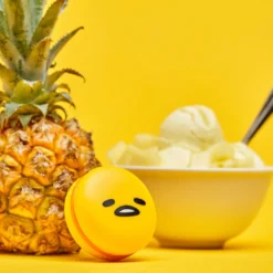 The Crème Shop X Sanrio Collabs Gudetama Macaron Lip Balm - Pineapple Sherbert